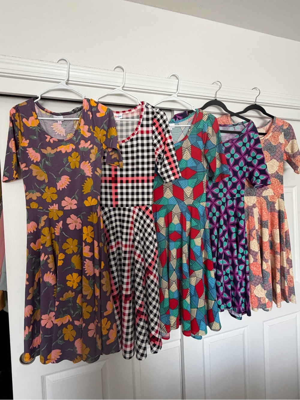 LuLaRoe Mixed-Print Skater Dresses in Purple, Pink, Yellow, Black, Teal & Cream
